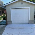 Garage door painting and install by handyman
